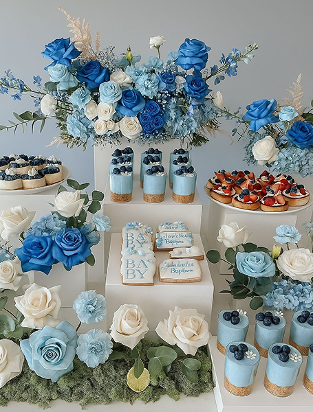Styled baby shower food display with coordinated blue-themed presentation by House of Chandel
