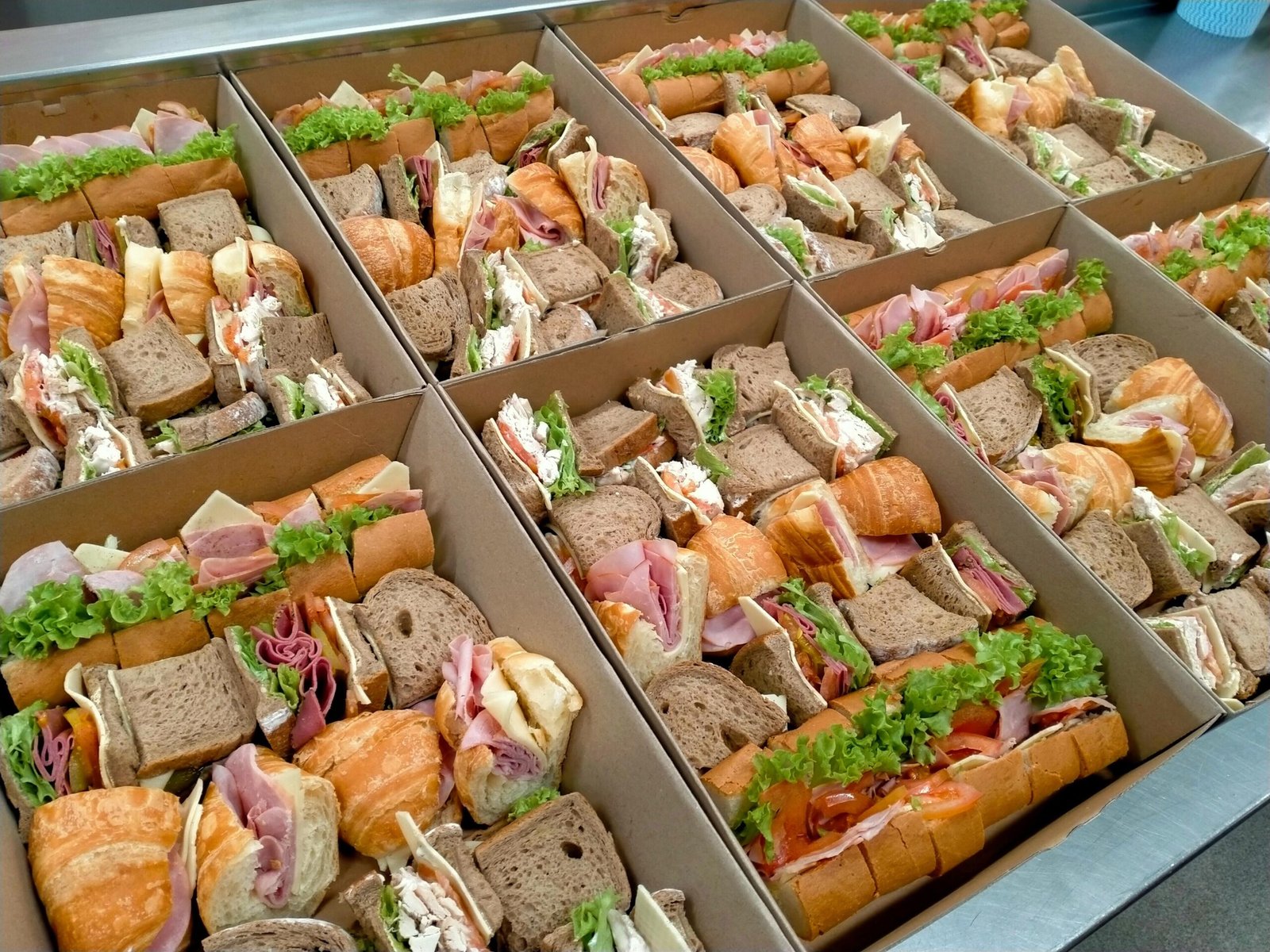 Generous office catering spread with varied dishes and elegant presentation for a corporate event in West London